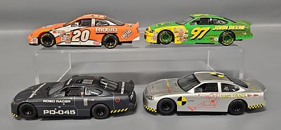 Six Scalextric 1/32 NASCAR Slot Cars to include Four Tony Stewart #20 Home Depot Pontiac Grand 