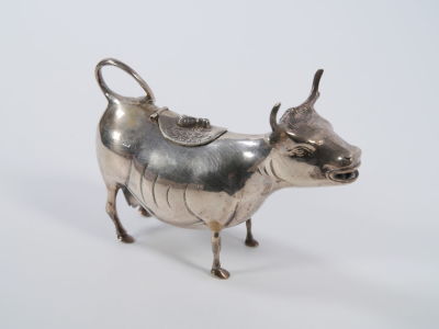 Silver bull-shape MILK container, 208g. German silver (800), signage. Good condition. Weight: 