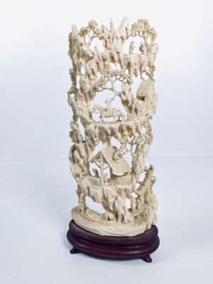 Country scene carved in ivory. height: 20 cm