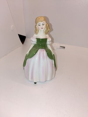 Vintage Royal Doulton "Penny" Figurine, HN 2338 (approx.). Charming vintage Royal Doulton