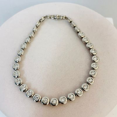 צמיד טניס זהב לבן 14K משובץ 3.00 קראט יהלומים טבעיים צבע F נקיון VS מק"ט 94. צמיד טניס זהב לבן 