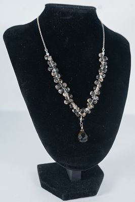 Lovely Smokey Quartz Pendant Necklace featuring side drilled teardrop gemstones and a faceted 