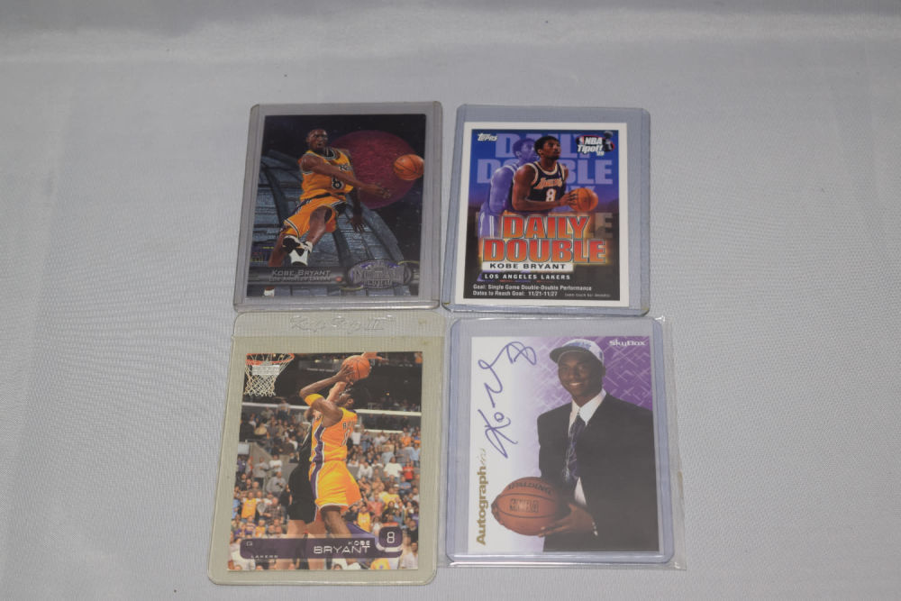 Lot 271: 4 KOBE BRYANT GRADED CARD 1999
