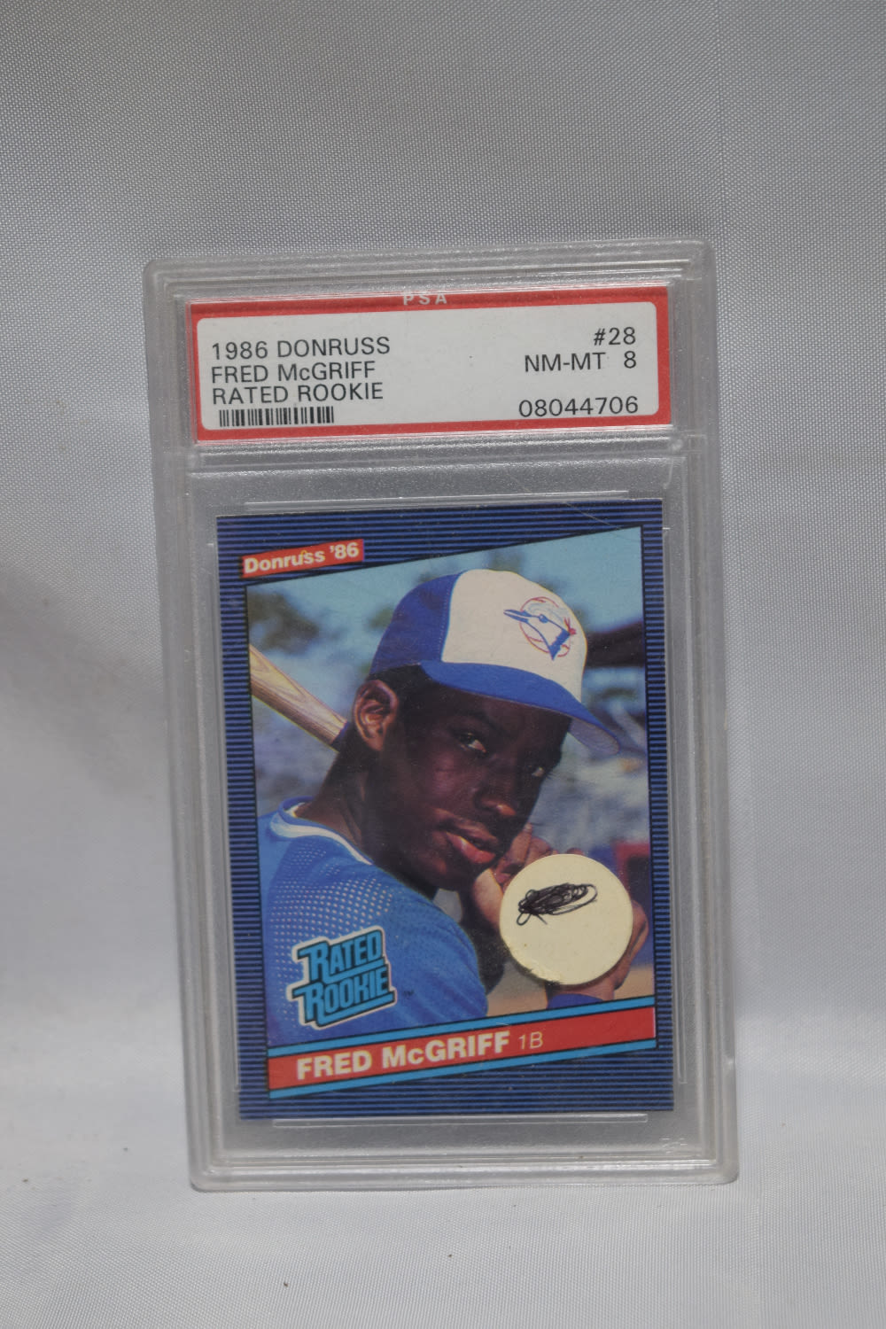 Lot 326: GRADED 1986 MCGRIFF ROOKIE CARD