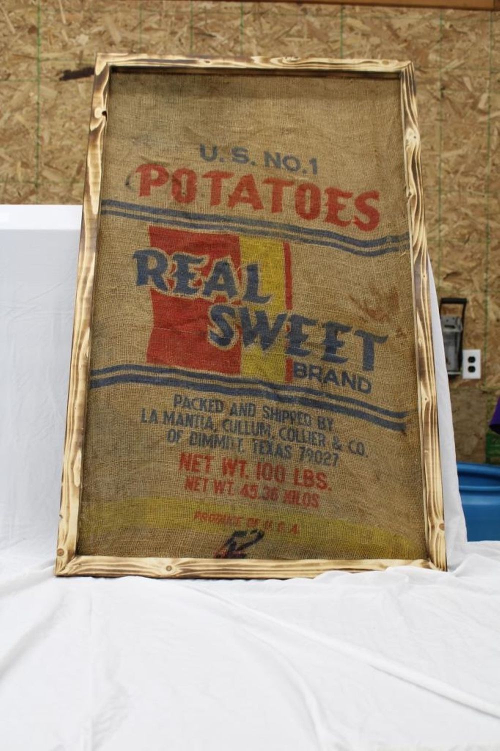 Lot 192: REAL SWEET POTATO SACK IN FRAME