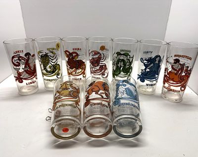 1 - BOX OF ZODIAC SIGN GLASSWARE SET. BOX OF 10 ZODIAC SIGN THEMED GLASSWARE, NOT A COMPLETE SET