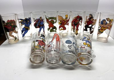 1 - BOX OF WALT DISNEY CHARACTER THEMED GLASSWARE. BOX OF 12 WALT DISNEY CHARACTER THEMED GLASSWARE