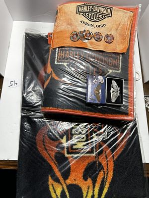 1 - HARLEY DAVIDSON RUG AND COLLECTOR ITEMS. TWO HARLEY DAVIDSON NON-SKID TUFTED RUGS (20"X30")