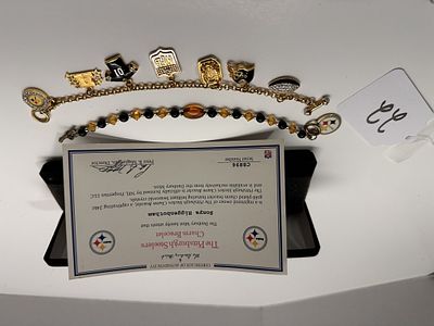 1 - PITTSBURGH STEELERS CHARM BRACELETS. CERTIFICATE OF AUTHENTICITY WITH BRACELETS