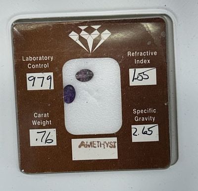 1 - AMETHYST GEM. 979 LABORATORY CONTROL, .76 CARAT WEIGHT, 1.55 REFRACTIVE INDEX, 2.65 SPECIFIC GRAVITY