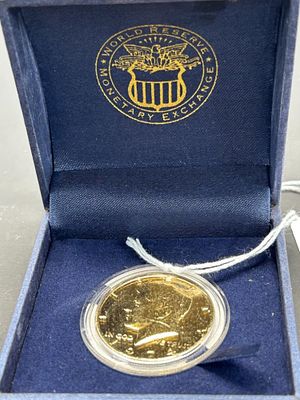 1 - WORLD RESERVE MONETARY EXCHANGE 1974. BOX IS COMING APART BUT STILL IN GOOD CONDITION, HALF A