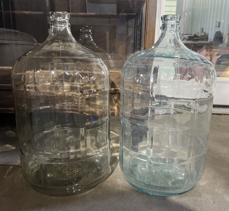 Lot 1296: (2) VINTAGE GLASS JUGS