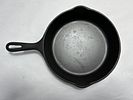 9 3/4IN CAST IRON SKILLET. VINTAGE SKILLET WITH UNMARKED MANUFACTURERImage - 1