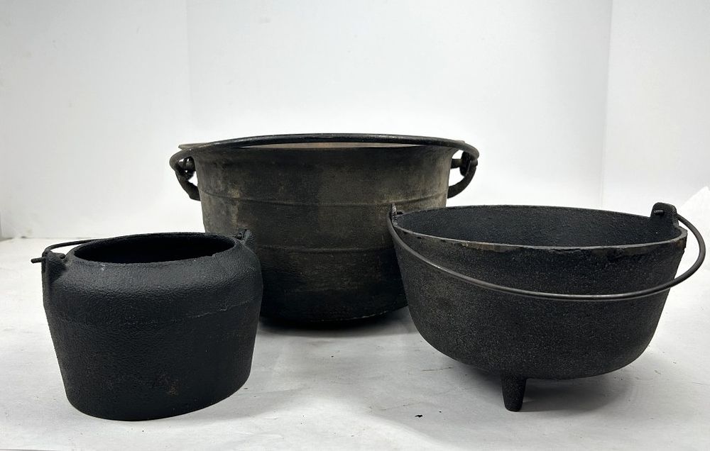 Lot 227: CAST IRON POTS