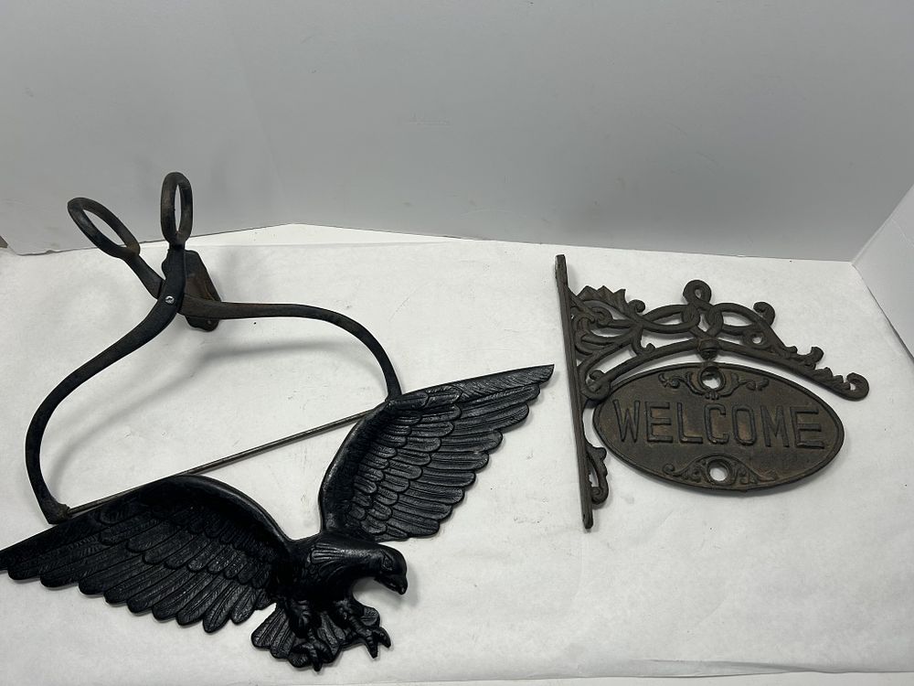 Lot 255: CAST IRON WELCOME SIGN