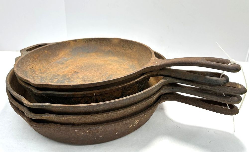 Lot 306: (5) LODGE CAST IRON SKILLETS