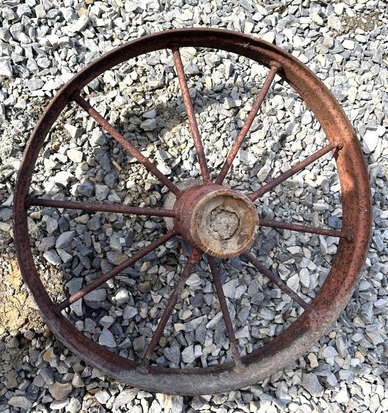 Lot 324: (1) CAST IRON BUGGY WHEEL
