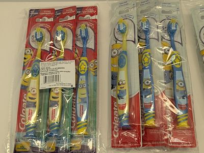 KIDS TOOTHBRUSHES. 24 COUNT OF MINION COLGATE TOOTHBRUSHES, EXTRA SOFT, AGES 5+