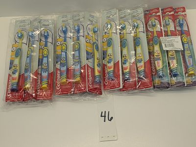 KIDS TOOTHBRUSHES. 24 COUNT OF MINION COLGATE TOOTHBRUSHES, EXTRA SOFT, AGES 5+