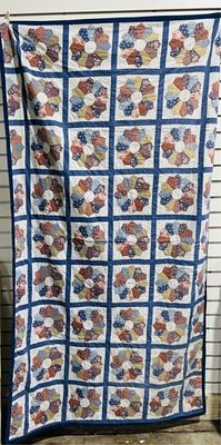 HANDMADE QUILT. 40INX72IN