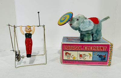 VINTAGE PARASOL ELEPHANT TOY AND WIND UP CELLULOID GYMNAST