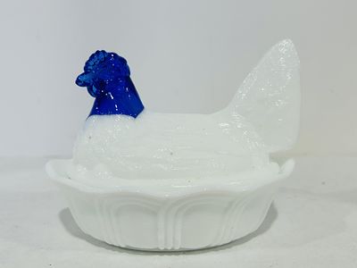 FENTON HEN ON NEST IN WHITE MILK GLASS WITH COBALT BLUE HEAD