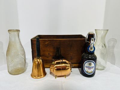 VINTAGE ORANGE MUCILAGE CRATE, LOT ALSO INCLUDES VINTAGE MILK BOTTLES, AND PIGGY BANKS