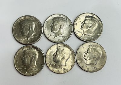 KENNEDY HALF DOLLARS. 4-1971 KENNEDY HALF DOLLARS 1985 KENNEDY HALF DOLLAR 1988 KENNEDY HALF DOLLAR