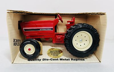 ERTL 1/16 INTERNATIONAL ROW CROP TRACTOR. DIECAST, REAR HITCH, MODEL #415, STOCK NUMBER 228