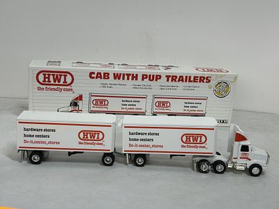 ERTL 1/64 HWI SEMI CAB WITH PUP TRAILERS. DIECAST, MODEL #901261 STOCK #2162