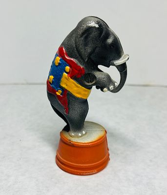 Cast Iron Elephant Still Bank on Drum Pedestal. A cast iron still bank depicting an elephant 