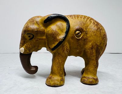 Antique Cast Iron Elephant Still Bank. This antique still bank is cast in iron and modeled as a 