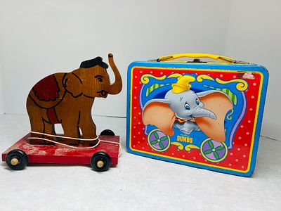 Two Vintage Circus-Themed Items including a Walt Disney Dumbo Thermos Lunchbox and a Wooden 