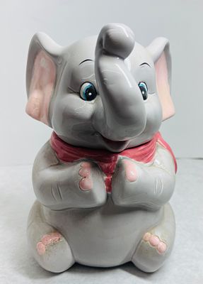 Vintage Glazed Ceramic Elephant Cookie Jar. A vintage glazed ceramic cookie jar modeled as a 