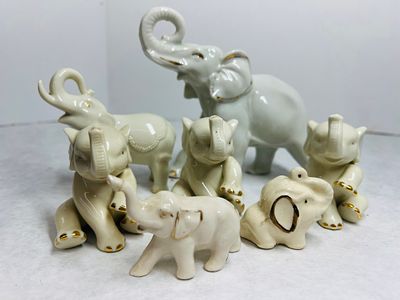 Porcelain Elephant Figurines Lenox. This collection of glazed porcelain elephant figurines is 