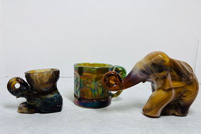 Vtg American Slag and Carnival Glass Elephants. This lot features three molded glass objects of 