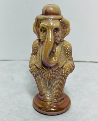 Summit Glass Iridescent Glass Billy Elephant Figurine. The reverse of the figurine features an 