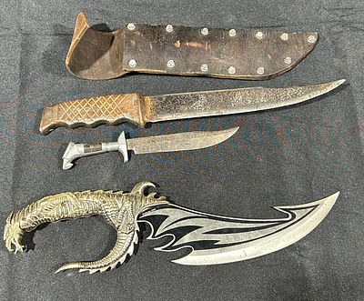 Fixed-Blade Knives Including Fantasy Dragon and Eagle Head Styles. This lot features three 