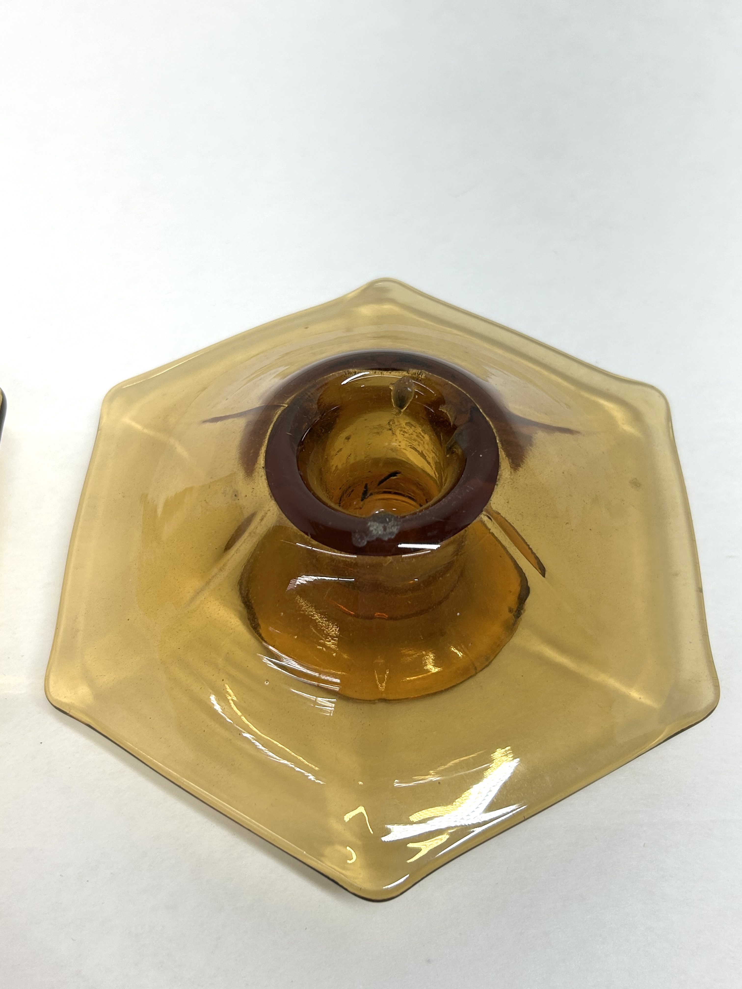 PAIR OF AMBER GLASS CANDLESTICKS