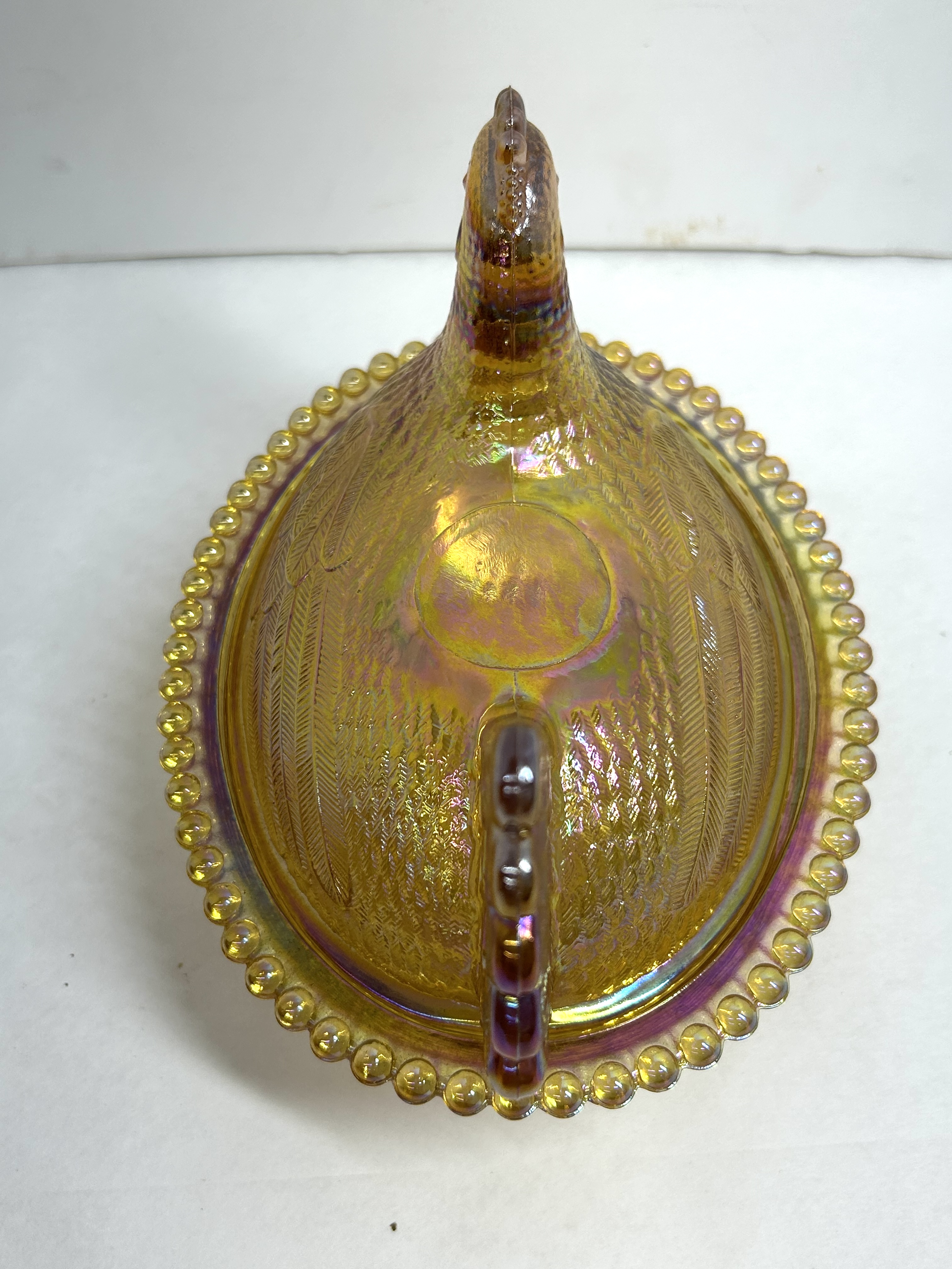 MARIGOLD IRIDESCENT GLASS HEN ON NEST DISH