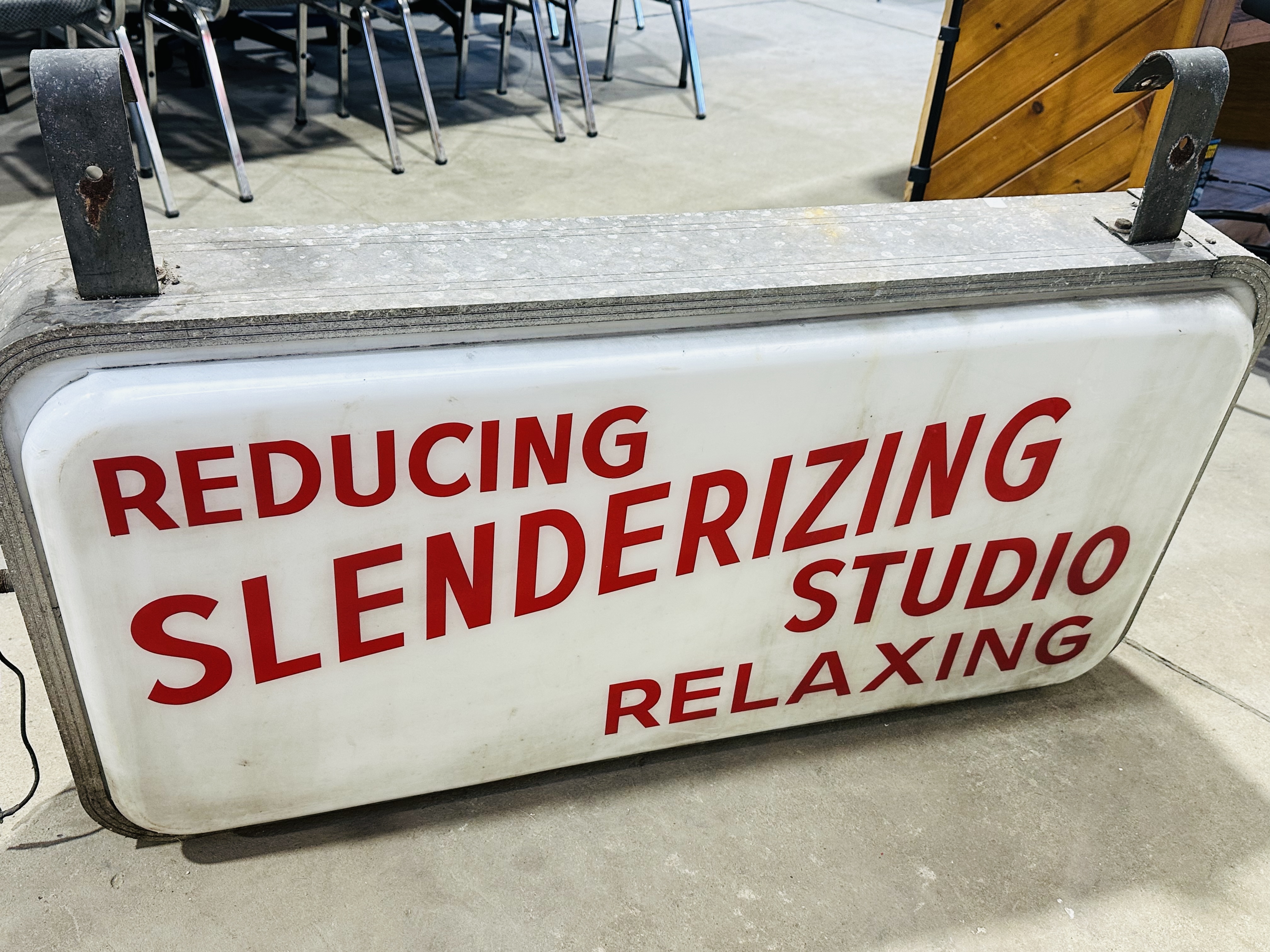 METAL SLENDERIZING STUDIO SIGN, CIRCA 1950