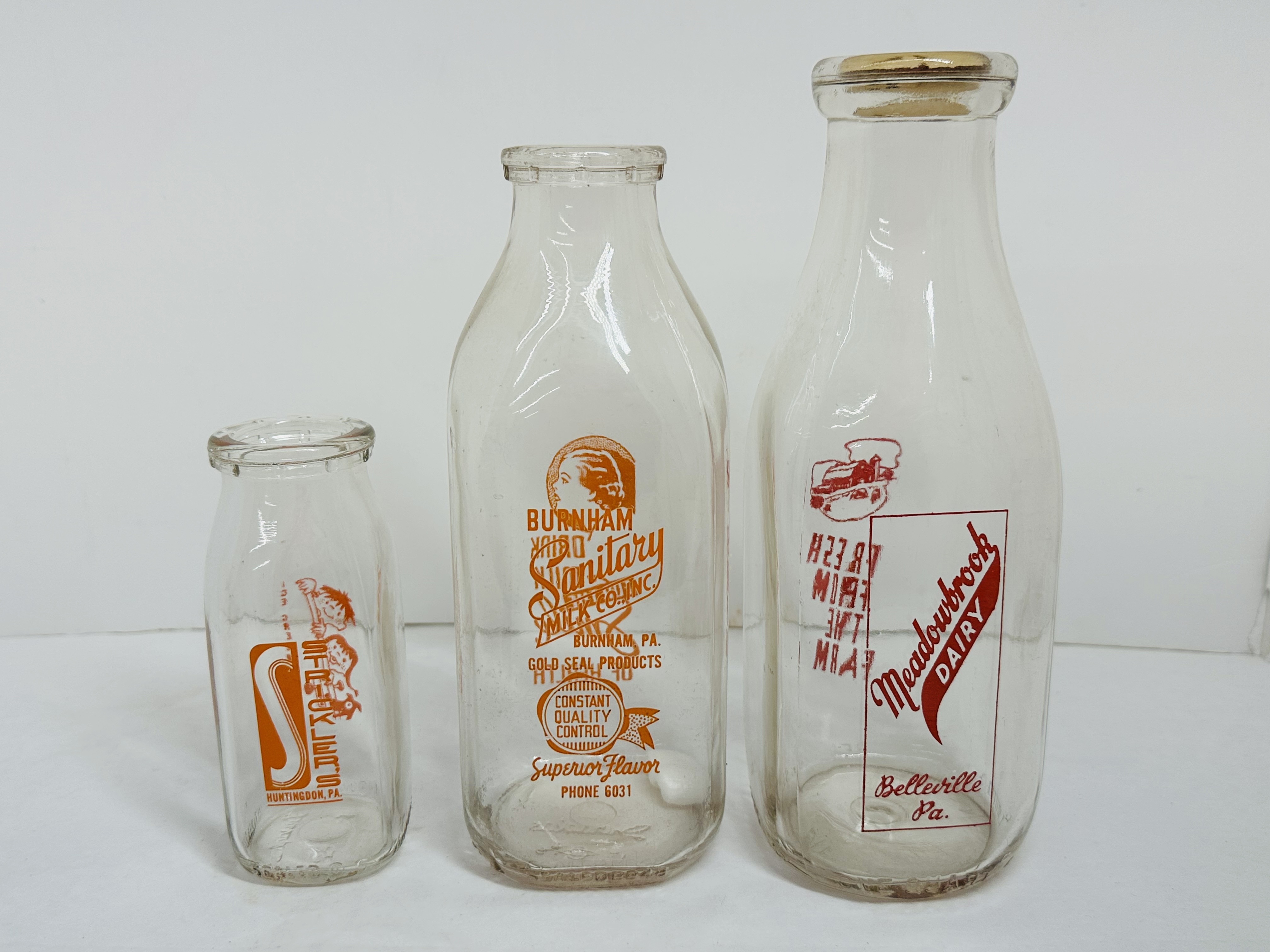 PENNSYLVANIA DAIRIES GLASS MILK BOTTLES, MID-20TH CENTURY