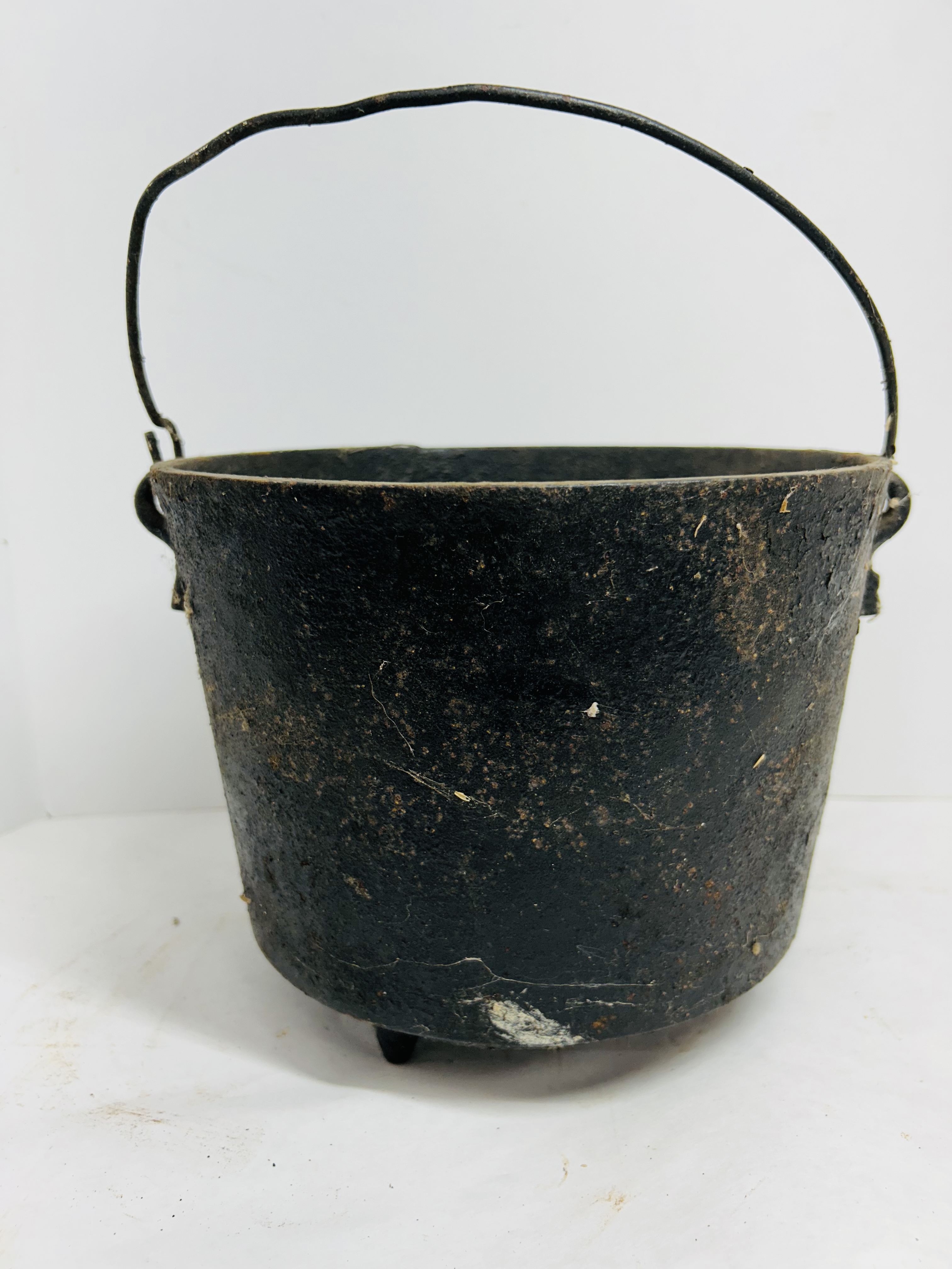 CAST IRON THREE-LEGGED CAULDRON, CIRCA 1900