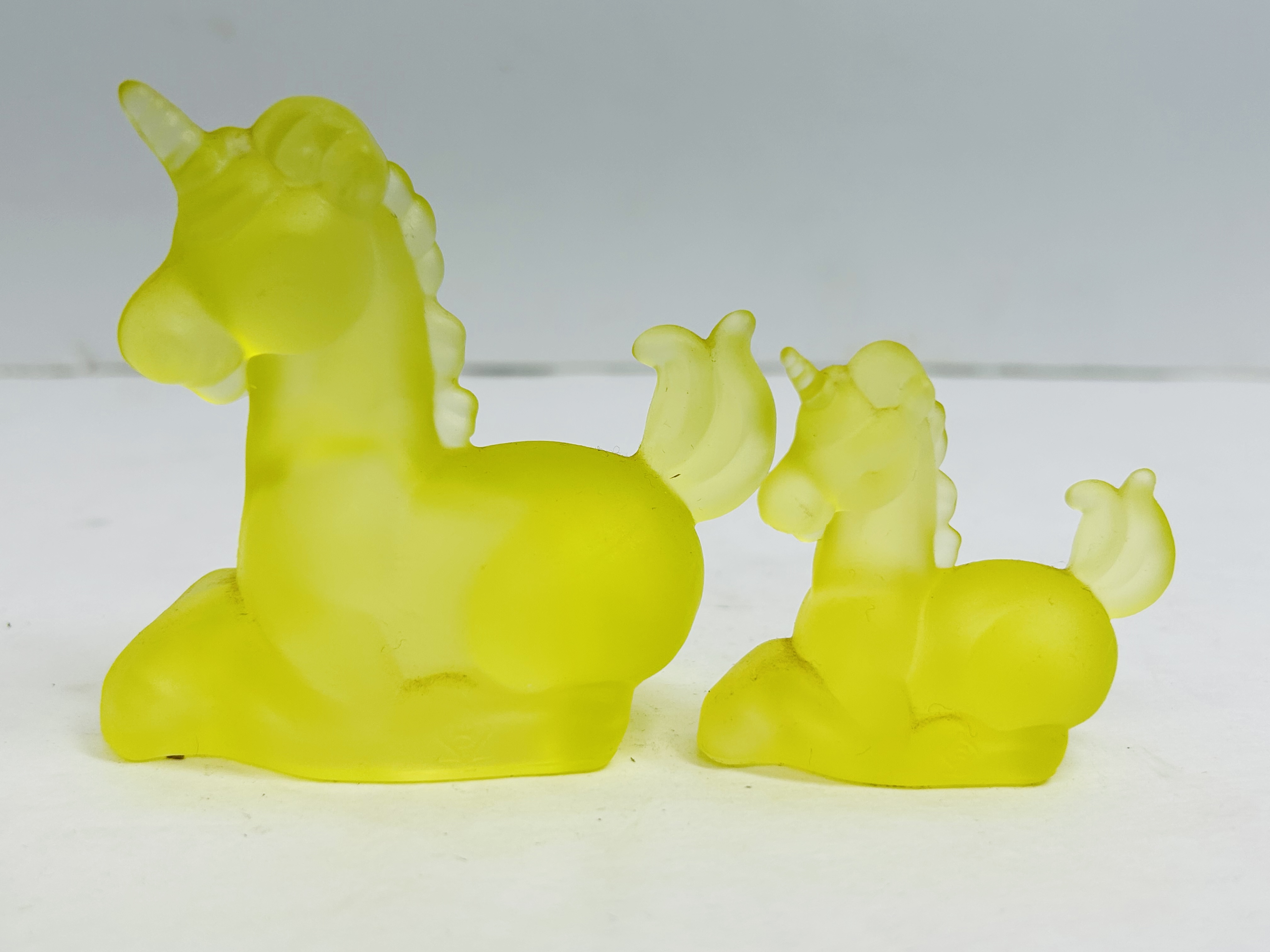 BOYD YELLOW GLASS UNICORNS, 20TH CENTURY