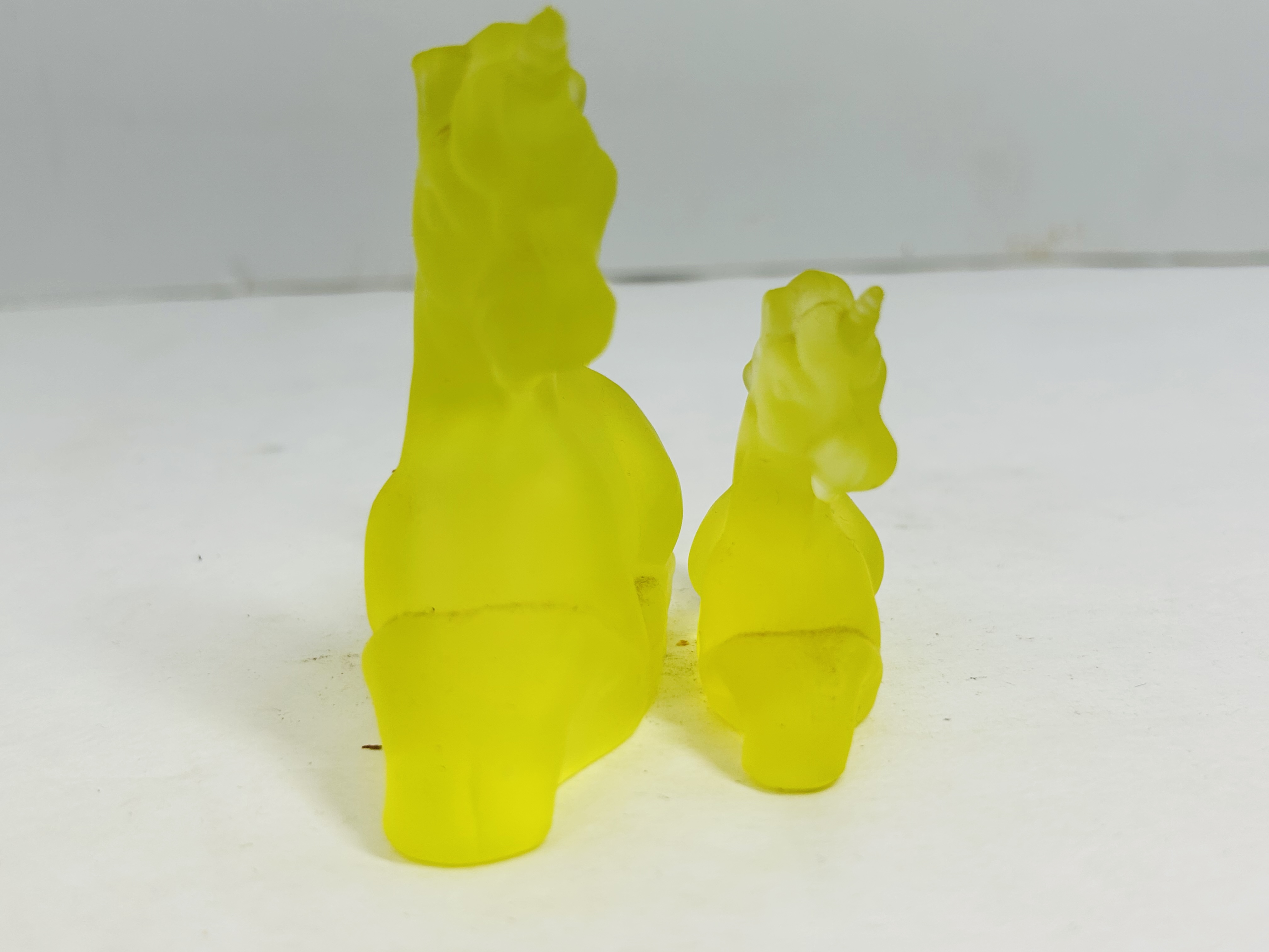 BOYD YELLOW GLASS UNICORNS, 20TH CENTURY