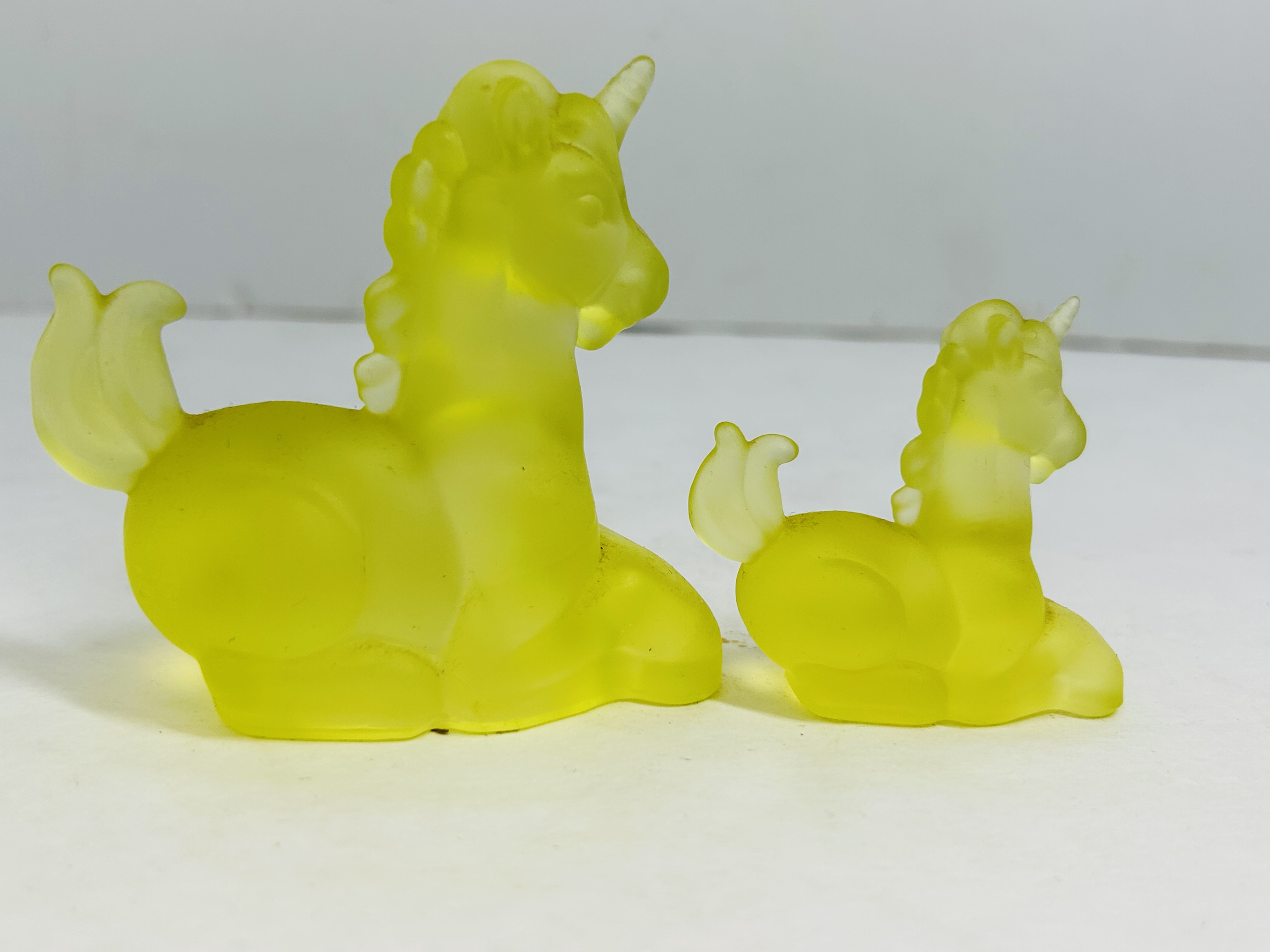 BOYD YELLOW GLASS UNICORNS, 20TH CENTURY