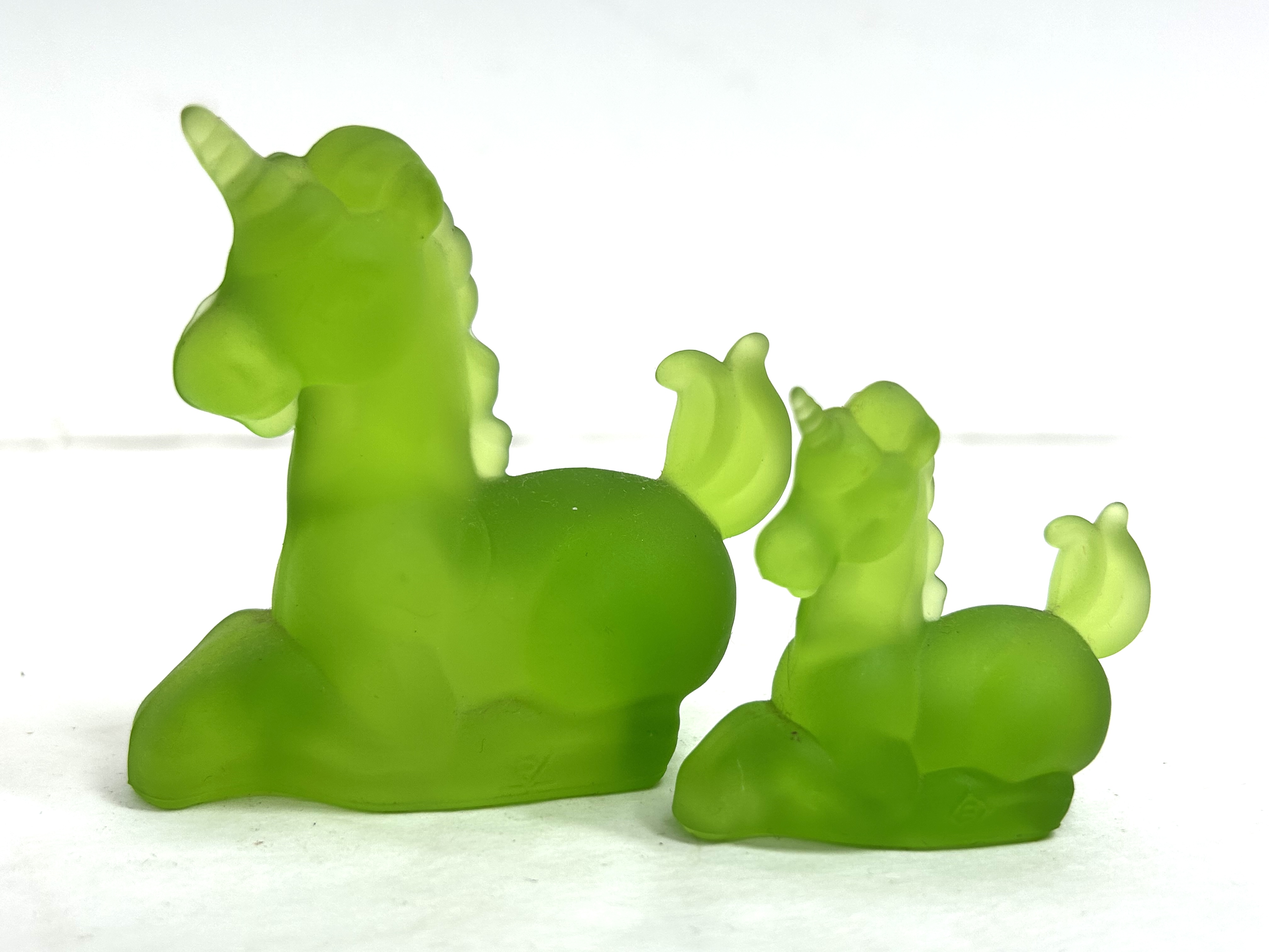 BOYD GREEN GLASS UNICORN PAIR, 1980S