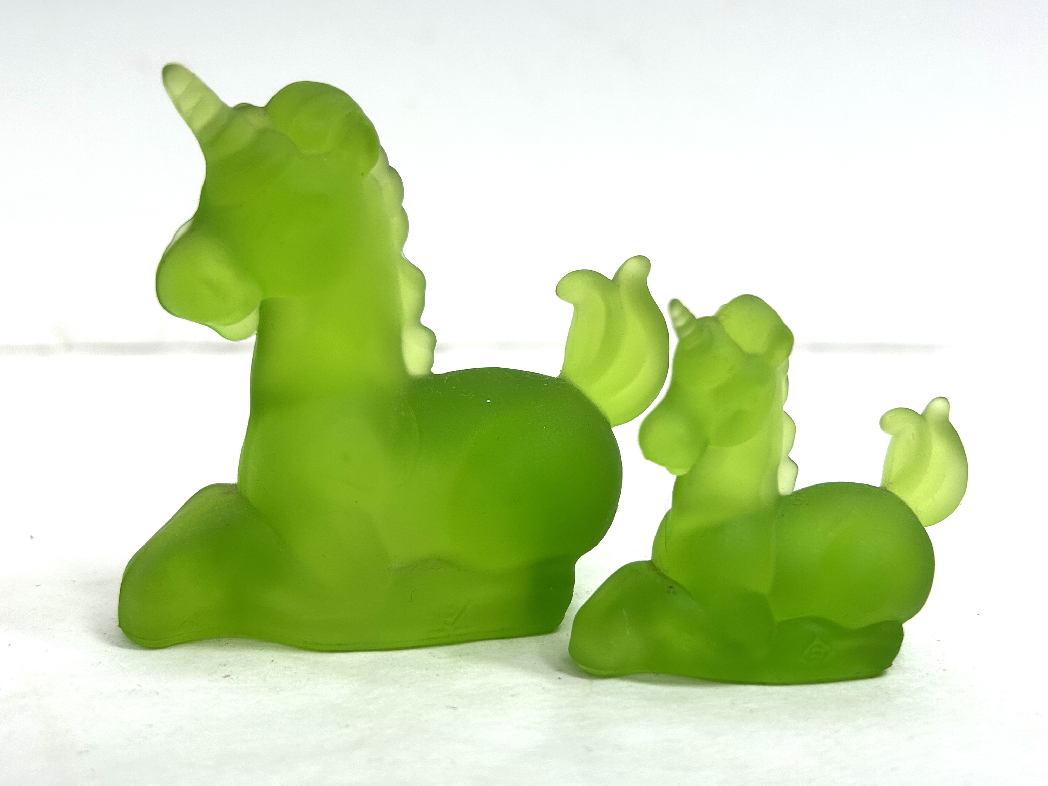 BOYD GREEN GLASS UNICORN PAIR, 1980S