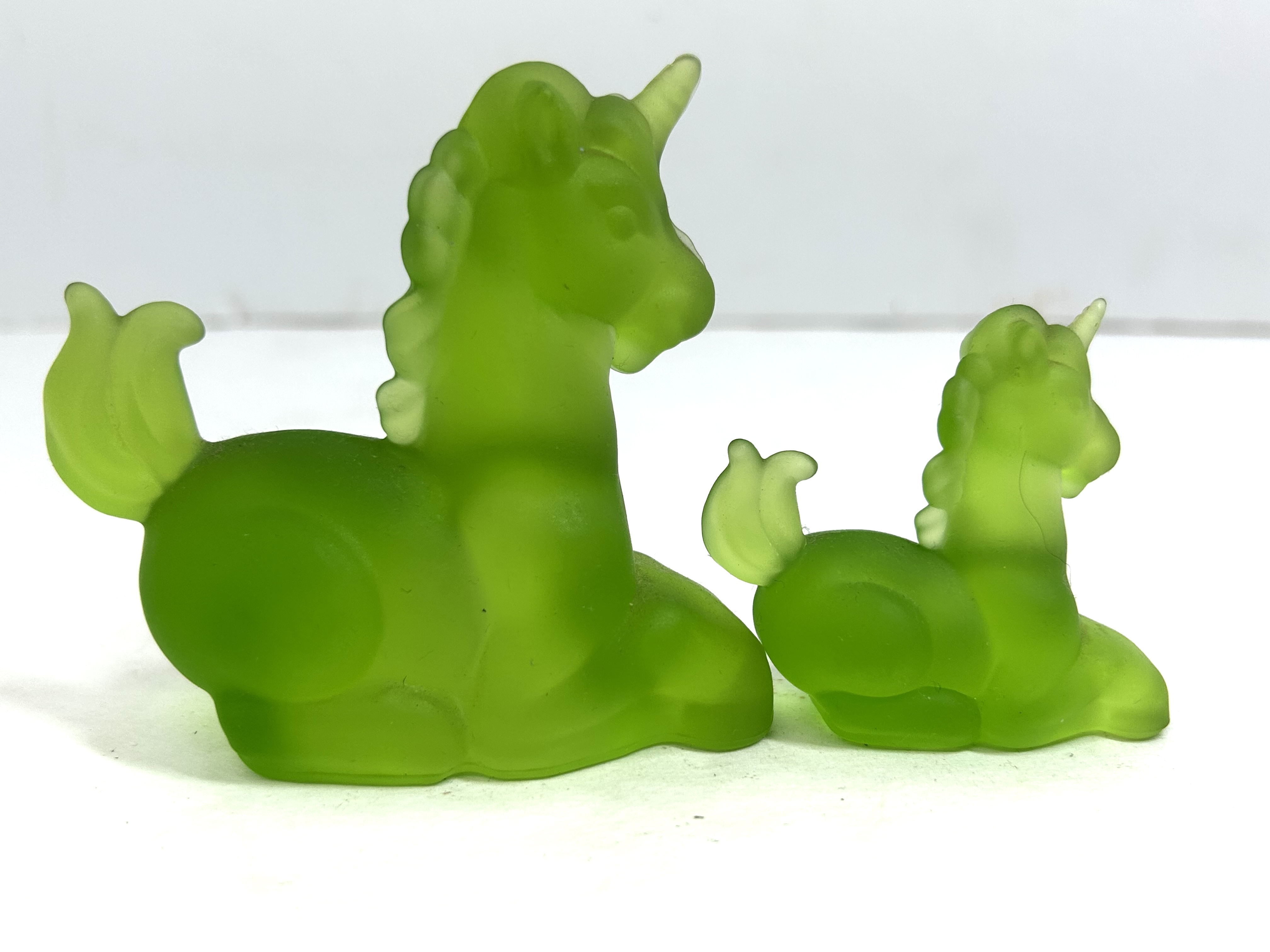 BOYD GREEN GLASS UNICORN PAIR, 1980S