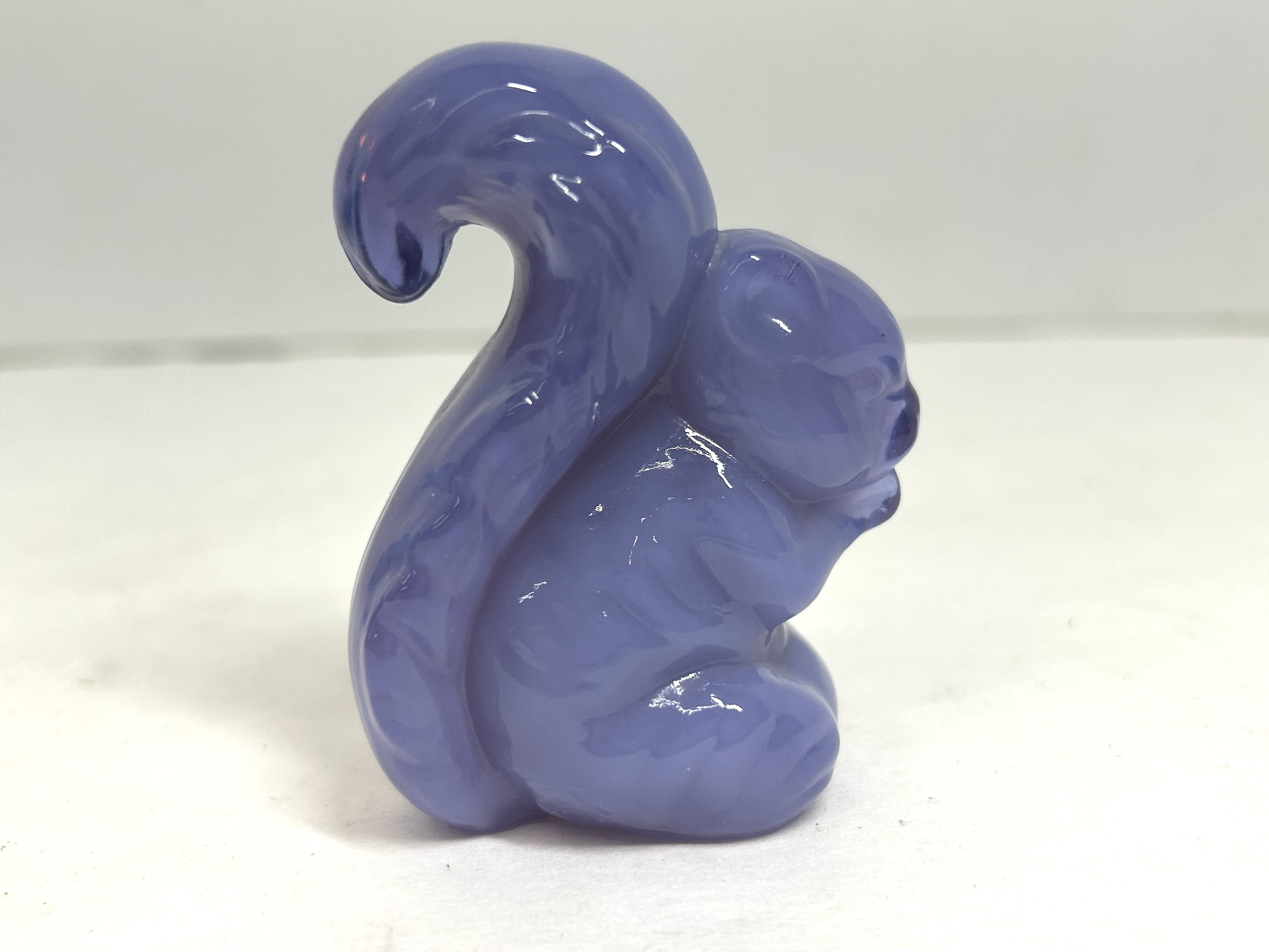 BOYD PURPLE GLASS SQUIRREL FIGURINES, 20TH CENTURY